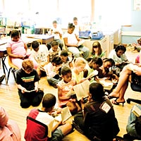 Third graders at Lenart take turns reading from Anne of Green Gables.